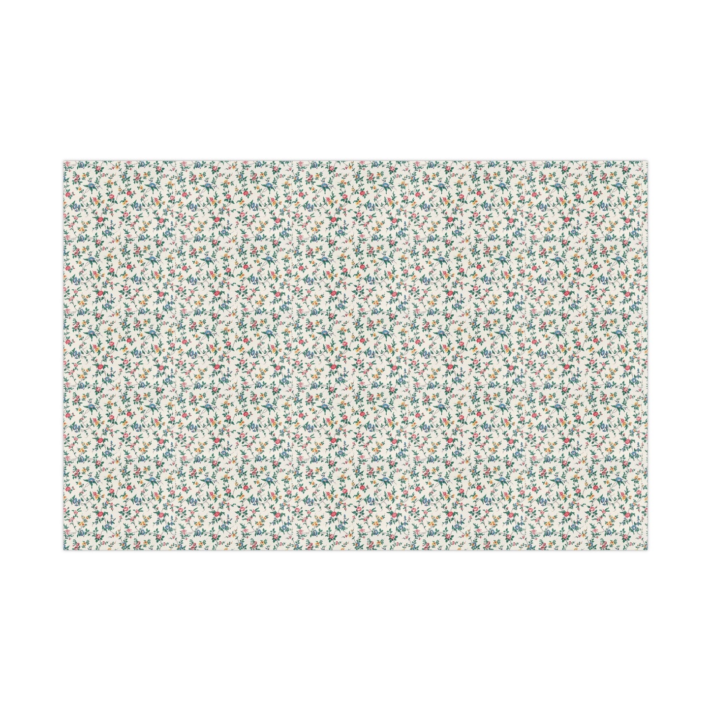 Floral patterned wrapping paper swatch on a white background